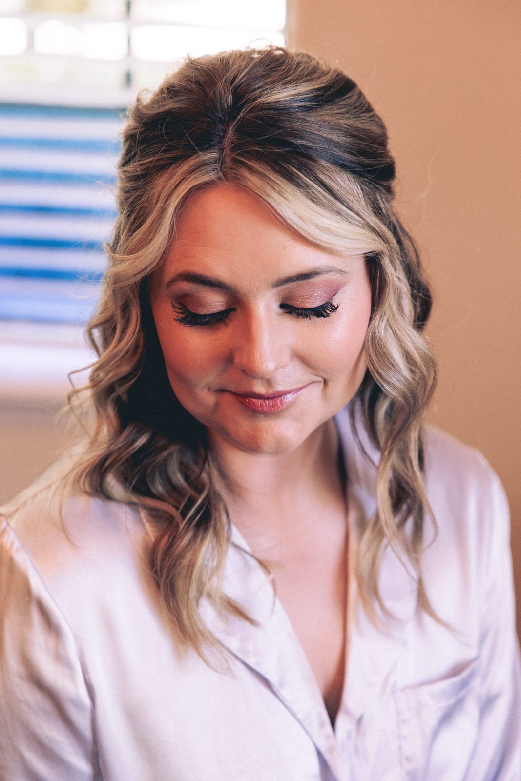 Loose bridal blowout with hand-placed extensions